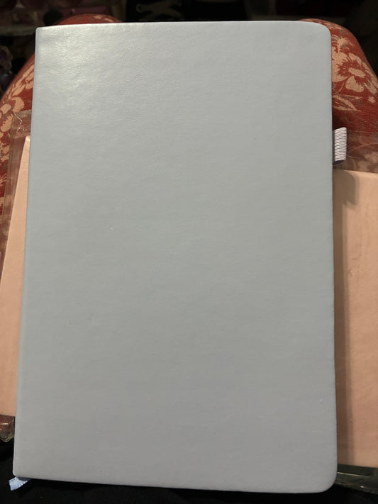 A5 note book includes a pen